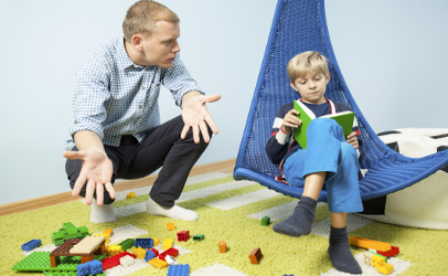 dad and child with messy room